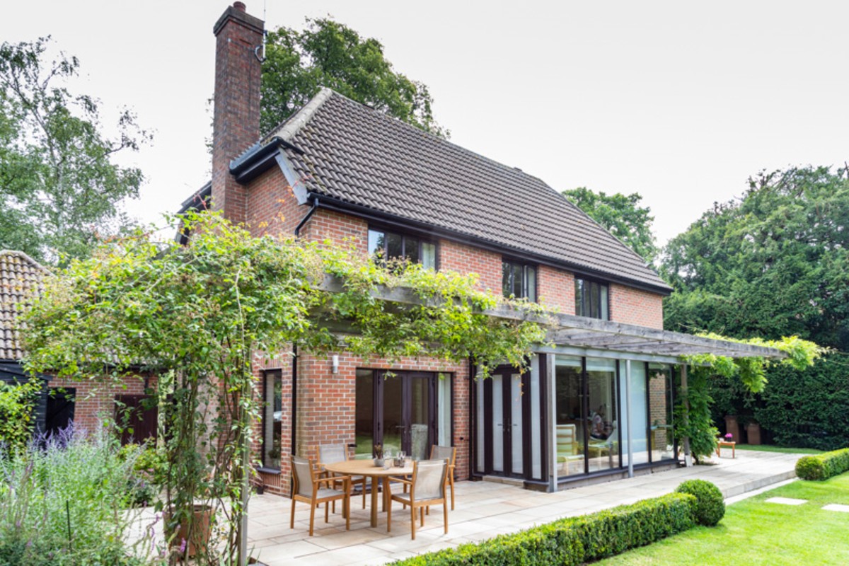 Contemporary View, Chelmsford Essex. Design and Build Cube 1994 Ltd. Pergola Climbers Box Hedging